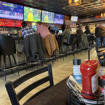 Fern Cafe - people sitting at the bar watching tvs - Diners Near Me - Findlay, Ohio