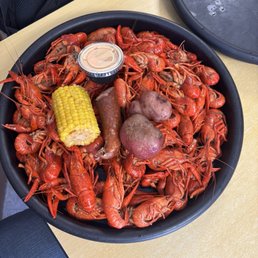 Three pounds of crawfish, andouille sausage, corn, and new potatoes Three pounds of crawfish, andouille sausage, corn, and new potatoes