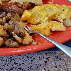 Henry's - Two Eggs which were supposed to be scrambled.  Rubbery bacon.  Uncooked toast.