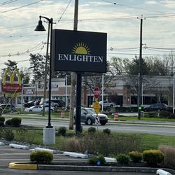 Enlighten Dispensary - Sign in front of store