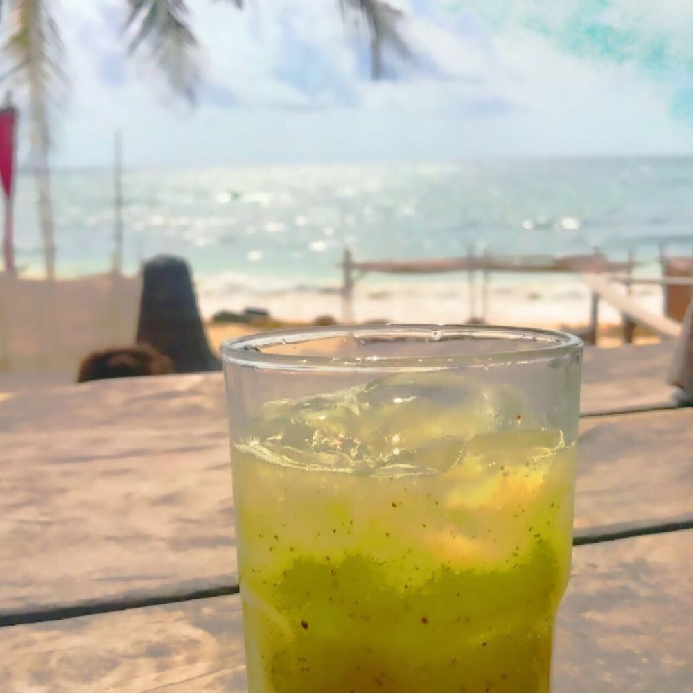 Papaya Playa Beach Bar - Kiwi fruit juice and some vitamin D - Beach Bars Near Me - Tulum, ROO Papaya Playa Beach Bar - Kiwi fruit juice and some vitamin D - Beach Bars Near Me - Tulum, ROO
