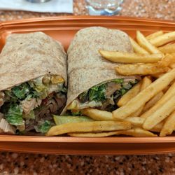 Wolfgang Puck Express - Dry and tasteless chicken caesar wrap.