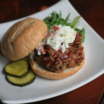 Ropewalk - Baltimore - a pulled pork sandwich with coleslaw and pickles - Bars Near Me - Baltimore, Maryland Ropewalk - Baltimore - a pulled pork sandwich with coleslaw and pickles - Bars Near Me - Baltimore, Maryland
