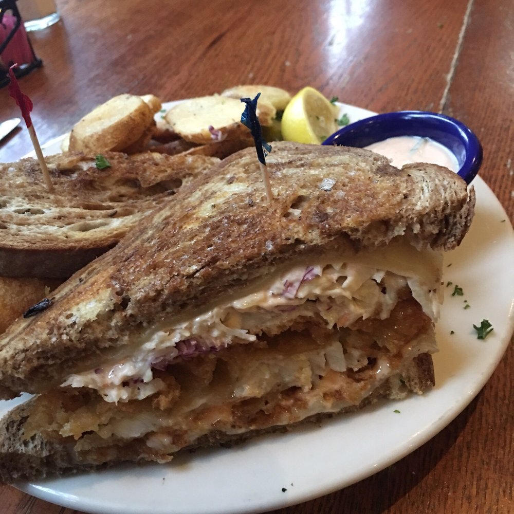 Cuzzy's - Beer battered haddock Reuben with fresh coleslaw - Pizza Near Me - Camden, Maine