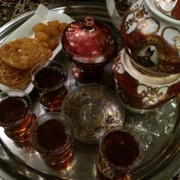 Tray of tea and sweets. Tray of tea and sweets.