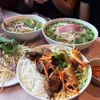 Pho Pasteur - Vermicelli with grilled pork, shrimp, and egg roll with small and large pho in back - Vietnamese Near Me - Boston, Massachusetts Pho Pasteur - Vermicelli with grilled pork, shrimp, and egg roll with small and large pho in back - Vietnamese Near Me - Boston, Massachusetts