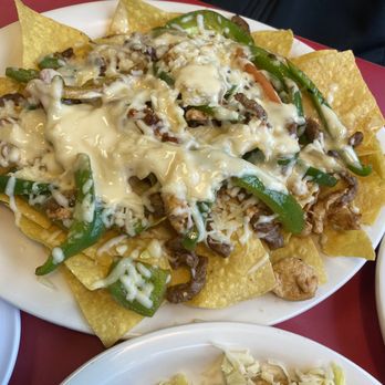 Crazy Taco - Fajita nachos and chicken chimichanga nachos fajita - Mexican Near Me - Olive Branch, Mississippi Crazy Taco - Fajita nachos and chicken chimichanga nachos fajita - Mexican Near Me - Olive Branch, Mississippi