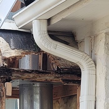 Just Pros Painting - This is the before photo. The water over flowed and it damaged the fireplace frame. - Painters Near Me
