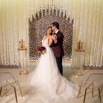 Ever After - First Kiss in Serenity - Elegant Gold Backdrop & Candlelit Aisle at Ever After Las Vegas - Wedding Planning Near Me - Las Vegas, Nevada Ever After - First Kiss in Serenity - Elegant Gold Backdrop & Candlelit Aisle at Ever After Las Vegas - Wedding Planning Near Me - Las Vegas, Nevada