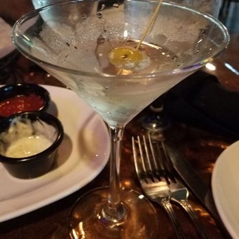 Cafe Murano - Dirty Tito's martini. The olives are stuffed with gorgonzola instead of blue cheese and they were the cats meow - Italian Near Me - Altamonte Springs, Florida Cafe Murano - Dirty Tito's martini. The olives are stuffed with gorgonzola instead of blue cheese and they were the cats meow - Italian Near Me - Altamonte Springs, Florida