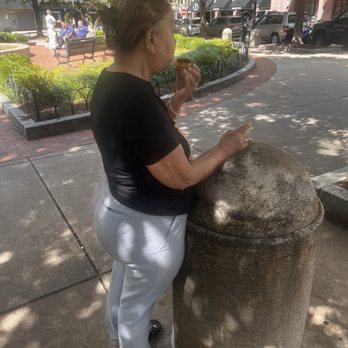 J & J Restaurant & Takeout - Mom eating a Pastel de Nata - Portuguese Near Me - Somerville, Massachusetts