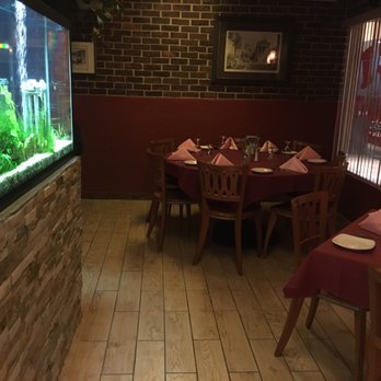 Amici Italian Eatery - A few a tables near the front - Italian Near Me - Largo, Florida Amici Italian Eatery - A few a tables near the front - Italian Near Me - Largo, Florida