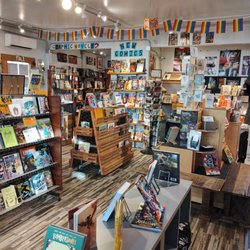 Outsider Comics And Geek Boutique - Wide angle view of inside of Outsider Comics.