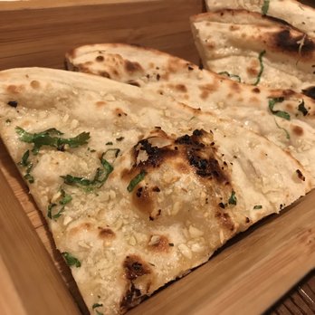 Indian Accent - Garlic naan. It's was good, but pricey for what it was - Indian Near Me - New York, New York