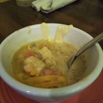 La Fiesta - a bowl of soup with a spoon in it - Mexican Near Me - Erie, Michigan
