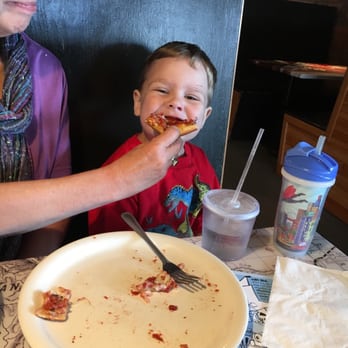 Trackside Pizza - Our grandson eating his favorite Trackside cheese pizza! Waiting for s train to go by! - Pizza Near Me - Puyallup, Washington Trackside Pizza - Our grandson eating his favorite Trackside cheese pizza! Waiting for s train to go by! - Pizza Near Me - Puyallup, Washington