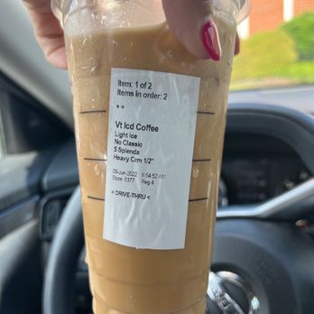 Starbucks - a hand holding a cup of iced coffee - Coffee & Tea Near Me - Glen Allen, Virginia Starbucks - a hand holding a cup of iced coffee - Coffee & Tea Near Me - Glen Allen, Virginia