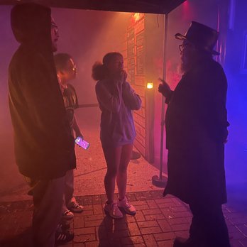 Nightfall Orphanage - Mr. Black speaking with guests and laying down the rules before they enter the Radiant Twilight - Haunted Houses Near Me - Seattle, Washington