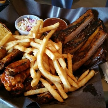 Big Bone BBQ and Wicked Wings - 1/2 rack of ribs & 1/2 pound of smoked wings in signature sauce with amazing fries, beans and coleslaw. - Barbeque Near Me - Barrie, Ontario Big Bone BBQ and Wicked Wings - 1/2 rack of ribs & 1/2 pound of smoked wings in signature sauce with amazing fries, beans and coleslaw. - Barbeque Near Me - Barrie, Ontario