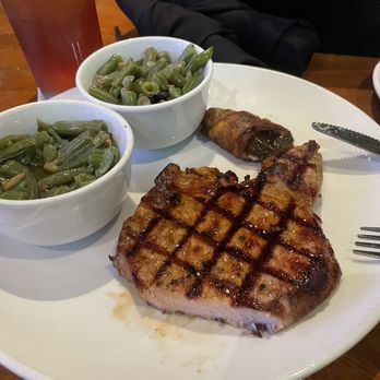 Flips Patio Grill - Pork chop with double green beans - Sports Bars Near Me - Fort Worth, Texas Flips Patio Grill - Pork chop with double green beans - Sports Bars Near Me - Fort Worth, Texas