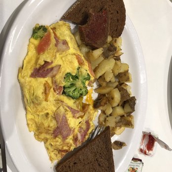 Breakfast Room - an omelet, potatoes, and toast - Breakfast & Brunch Near Me - Toronto, Ontario