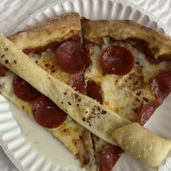 Piazza Pizza and Beach Bodega - Cheese was plentiful and breadsticks were delicious. - Pizza Near Me - Pensacola Beach, Florida Piazza Pizza and Beach Bodega - Cheese was plentiful and breadsticks were delicious. - Pizza Near Me - Pensacola Beach, Florida