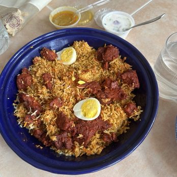 Biryani Point At India Bazaar - Boneless chicken biryani with gravy and Raita . - Indian Near Me - Fairfax, Virginia