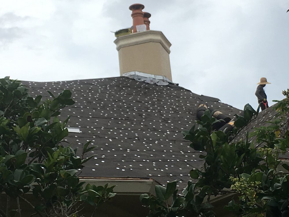 Slide of MilBar Construction and Roofing