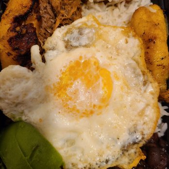Leonore Restaurant  - A fried egg over white rice, shredded beef, black beans, sweet ripe plantains, and avocado. - Italian Near Me - Salem, Virginia