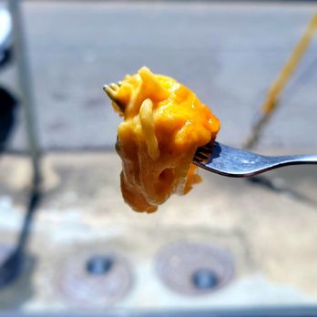 Pop's Poboys - a fork full of macaroni and cheese - Burgers Near Me - Lafayette, Louisiana