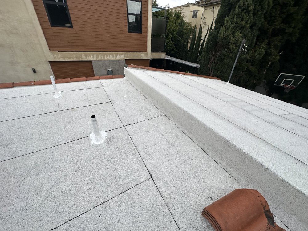 Slide of 3G Tres Generaciones Roofing