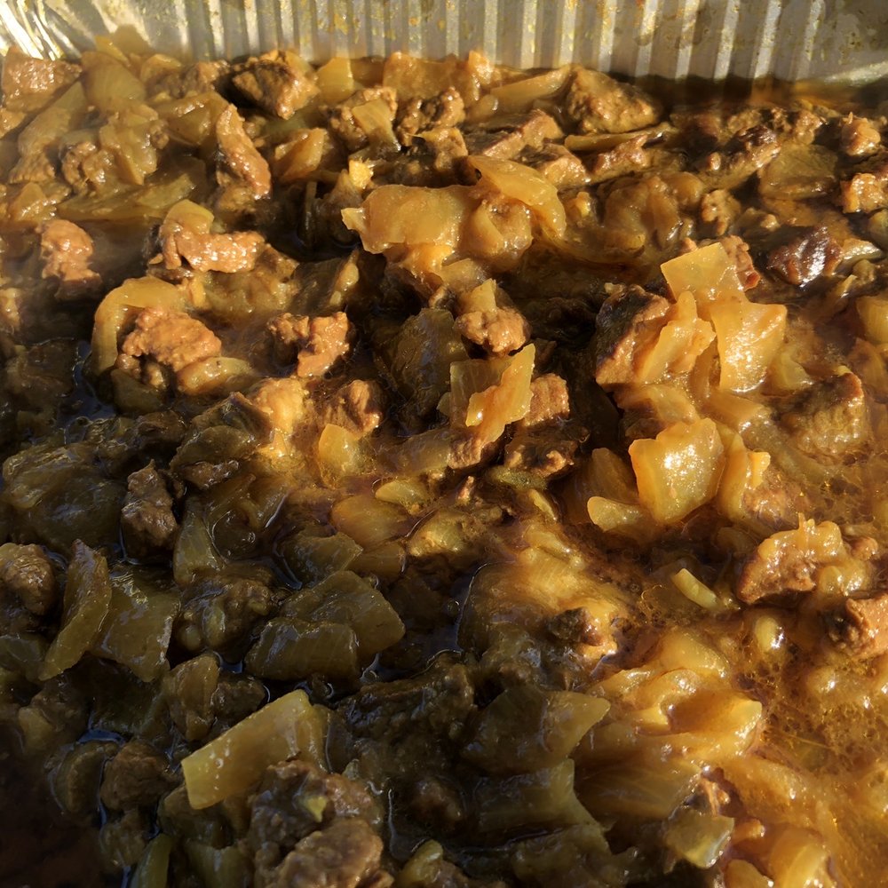 Injera Everywhere - a close up of a dish of food - Food Stands Near Me Injera Everywhere - a close up of a dish of food - Food Stands Near Me