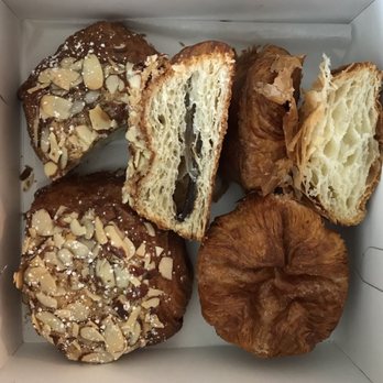 Hewn Bakery - bisections of chocolate almond croissant (L) and kouign-amann (R) - Bakeries Near Me - Evanston, Illinois