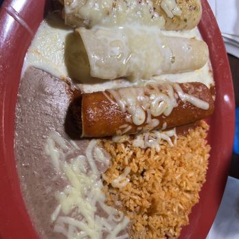 El Centenario - Enchiladas - one chicken, beef, and cheese with red, quest, and green sauce. - Mexican Near Me - Camdenton, Missouri El Centenario - Enchiladas - one chicken, beef, and cheese with red, quest, and green sauce. - Mexican Near Me - Camdenton, Missouri