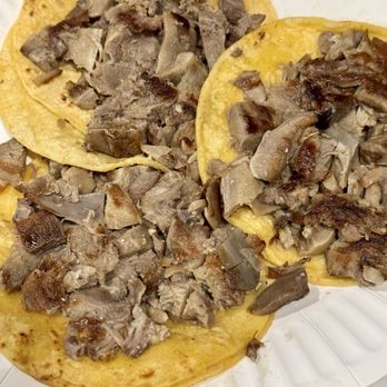 Tacos La Cuadra - Tacos Lengua (tongue) with no toppings - Mexican Near Me - Seattle, Washington Tacos La Cuadra - Tacos Lengua (tongue) with no toppings - Mexican Near Me - Seattle, Washington