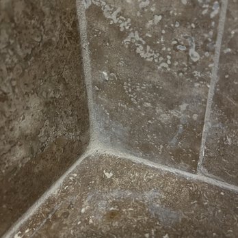 Kennyman The Handyman - This is how he applied grout between tiles. It is too thick. It is on top of tiles, not between as is the existing work. Haze left uncleaned - Plumbing Near Me Kennyman The Handyman - This is how he applied grout between tiles. It is too thick. It is on top of tiles, not between as is the existing work. Haze left uncleaned - Plumbing Near Me
