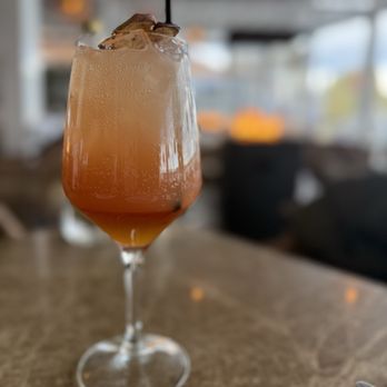 Trata On The River - Sunset in Santorini mocktail - Salad Near Me - Piermont, New York Trata On The River - Sunset in Santorini mocktail - Salad Near Me - Piermont, New York