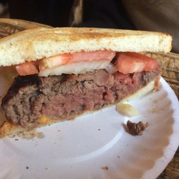 Louis' Lunch - Cheeseburger with tomato and onion - Burgers Near Me - New Haven, Connecticut