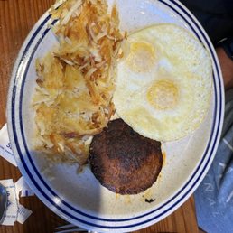Chorizo with over medium eggs and hash browns