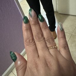 Saint Patrick nails. Dip powder . I love them. Great work all the time .