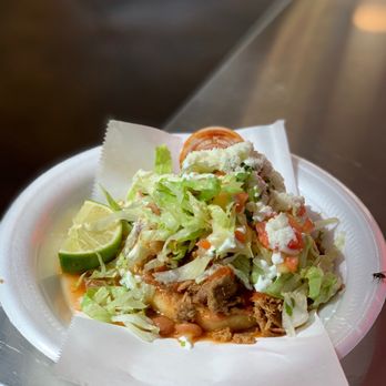 Ana Maria - a plate of food on a table - Mexican Near Me - Los Angeles, California Ana Maria - a plate of food on a table - Mexican Near Me - Los Angeles, California
