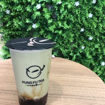 Kung Fu Tea - a cup of coffee on a table - Bubble Tea Near Me - Mississauga, Ontario Kung Fu Tea - a cup of coffee on a table - Bubble Tea Near Me - Mississauga, Ontario