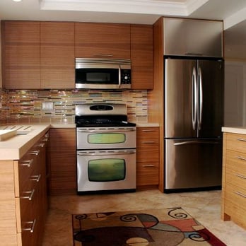 Sunshine Coast Construction - a kitchen with stainless steel appliances - General Contractors Near Me - San Diego, California Sunshine Coast Construction - a kitchen with stainless steel appliances - General Contractors Near Me - San Diego, California