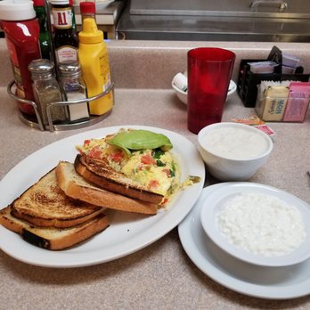 Dinner Bell Cafe - Southern Omelette, cottage cheese and sode of sausage gravy - Breakfast & Brunch Near Me - Prescott, Arizona Dinner Bell Cafe - Southern Omelette, cottage cheese and sode of sausage gravy - Breakfast & Brunch Near Me - Prescott, Arizona