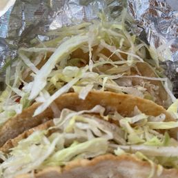 Enchiladas tacos and what I paid.