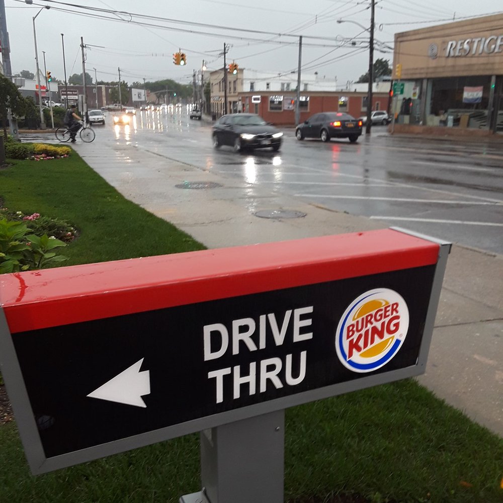 Burger King - a drive thru sign on a rainy day - Burgers Near Me - Freeport, New York Burger King - a drive thru sign on a rainy day - Burgers Near Me - Freeport, New York