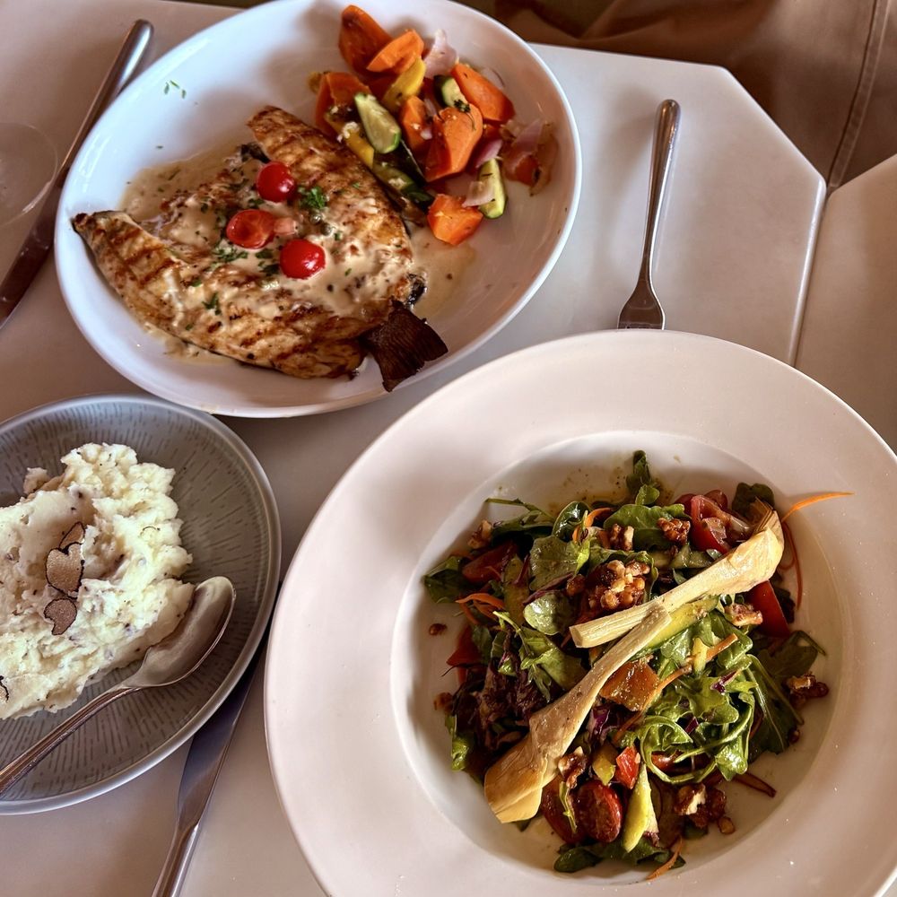 Elia - Branzino with side of truffle mash potatoes &Elia salad - Italian Near Me - Miami, Florida Elia - Branzino with side of truffle mash potatoes &Elia salad - Italian Near Me - Miami, Florida