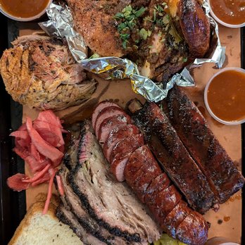 Southern Junction - Texas Trinity & 2 Meats. 1/3 lb each of Brisket, Sausage, Ribs & our choice of Pulled Pork, Half Dip Dip Chicken. - Indian Near Me - Buffalo, New York
