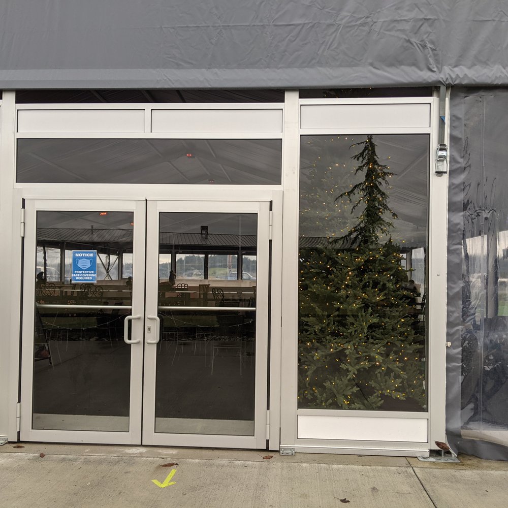 Snohomish Valley Golf Center - Front of the "outdoors" ice skating facility, with four walls and a roof - Golf Near Me - Snohomish, Washington