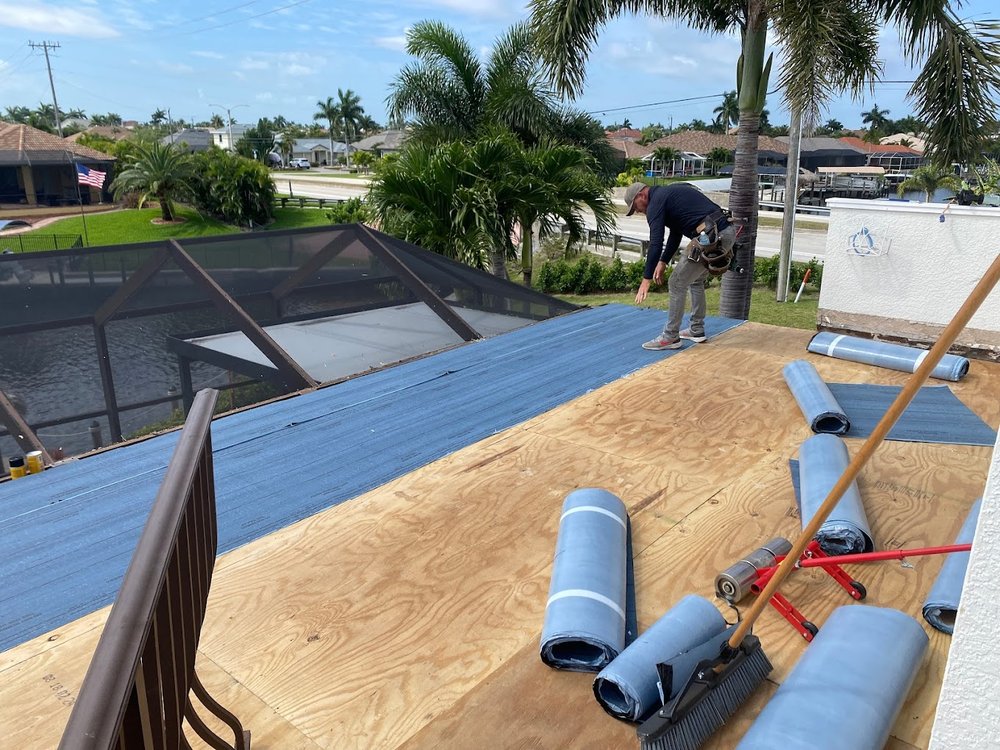 Slide of Whitby Roofing